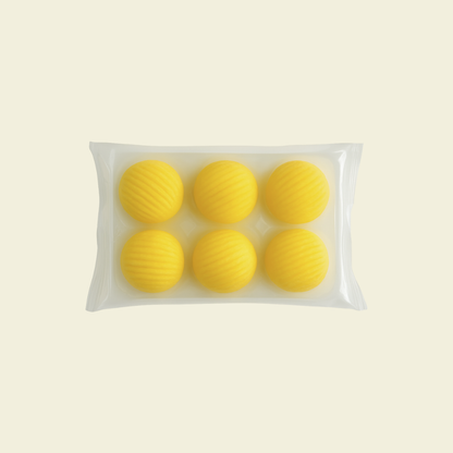 Frozen lava custard buns arranged in packaging, 6 pieces per pack